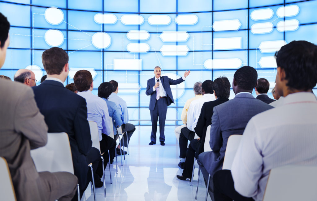 Large group of people in business presentation